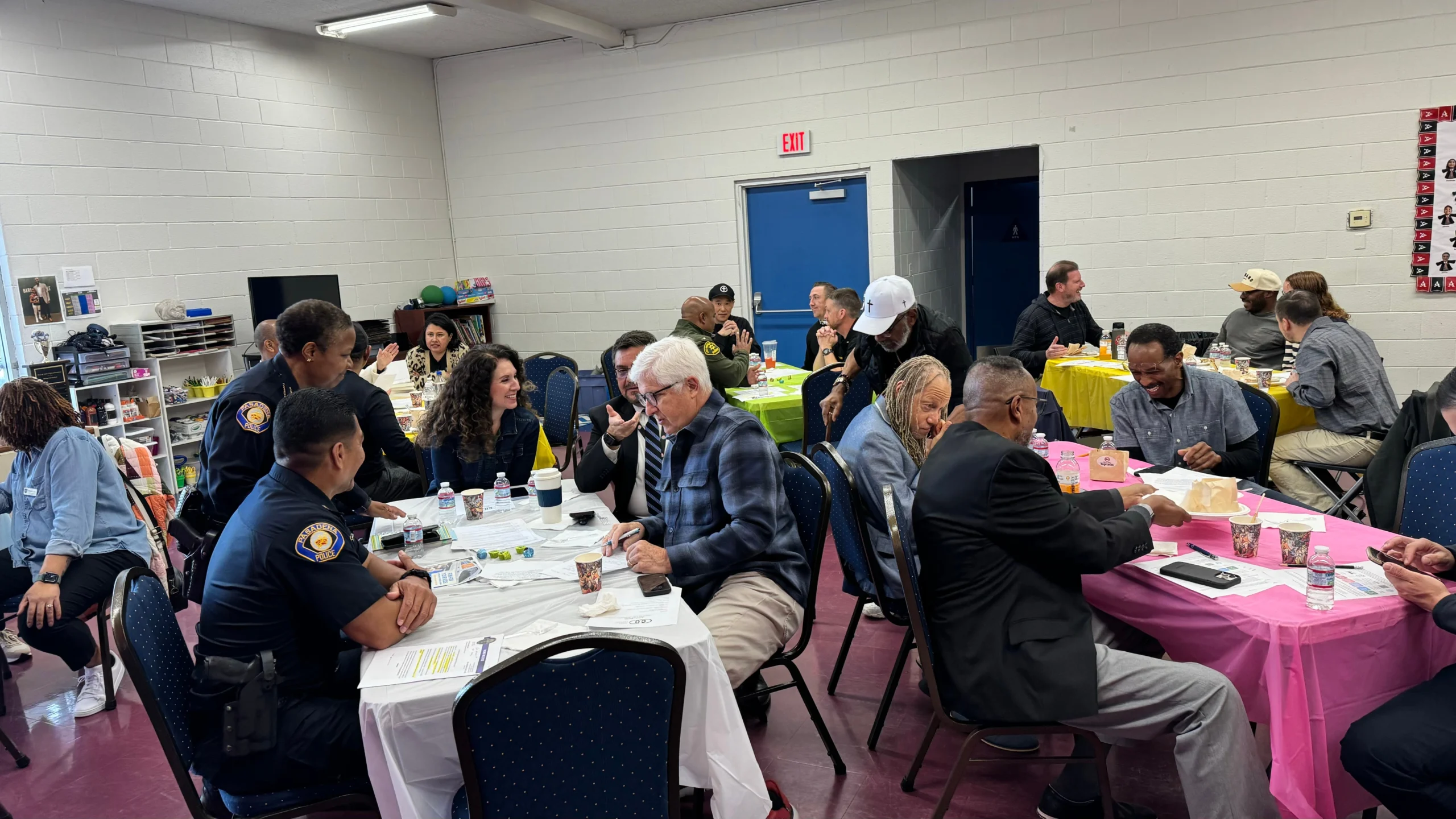 People seated together at a community gathering.